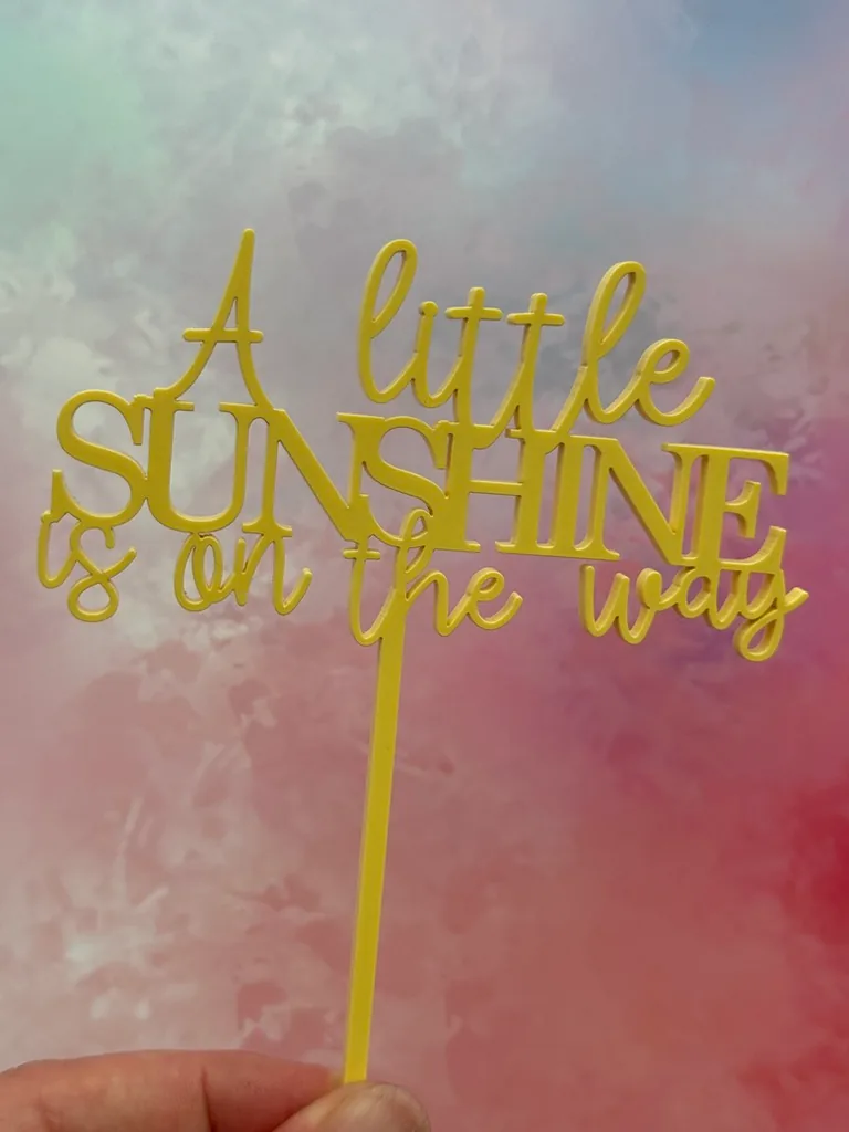 Yellow topper reading A little sunshine is on the way